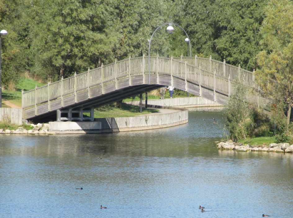 Arched Steel beam bridge with hardwood fascia - Ref 1821